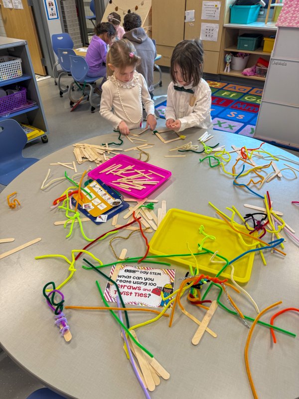 Delaney Thompson, left, and Matthew Priddy take a turn getting creative with twisty straws.